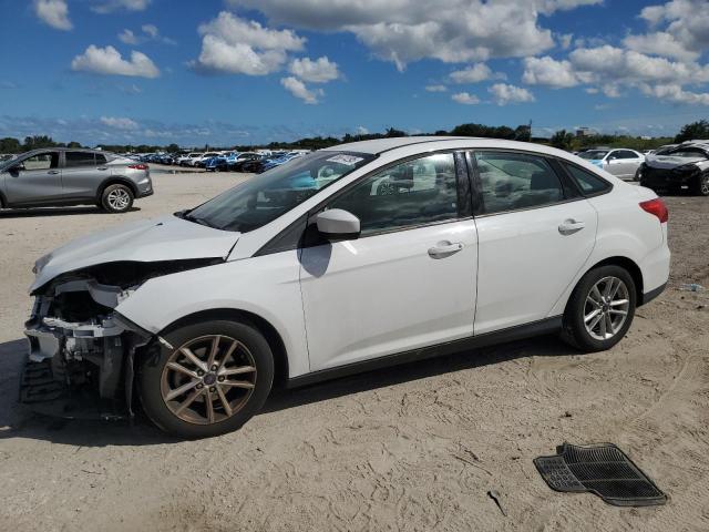 FORD FOCUS SE 2018 with VIN 1FADP3F2XJL326868 - Photo from auction