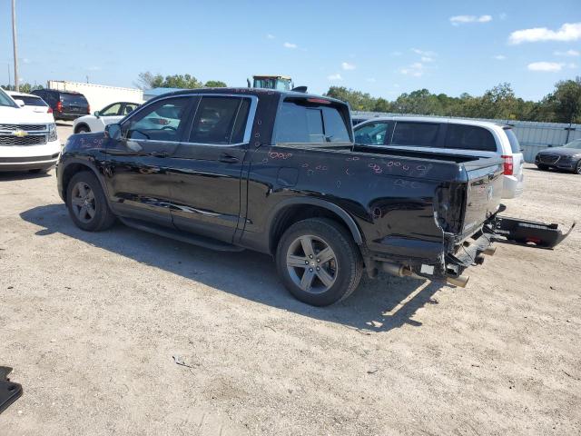 Photo 2 from auction – 2022 HONDA RIDGELINE with VIN 5FPYK3F51NB031114