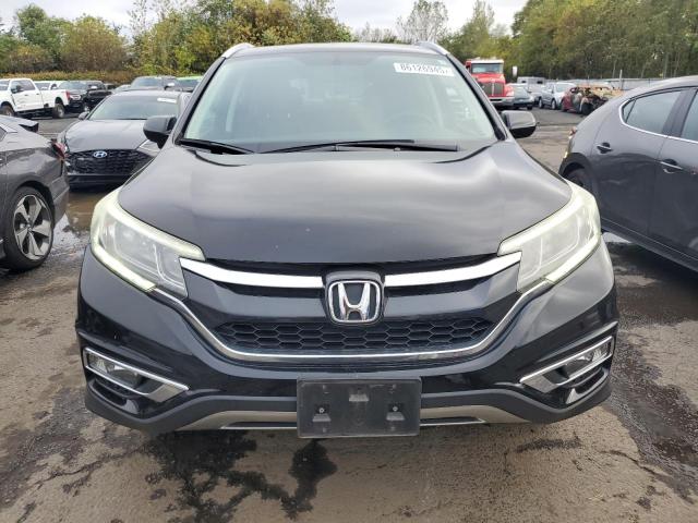 Photo 5 from auction – 2016 HONDA CR-V EXL with VIN 2HKRM4H79GH633114