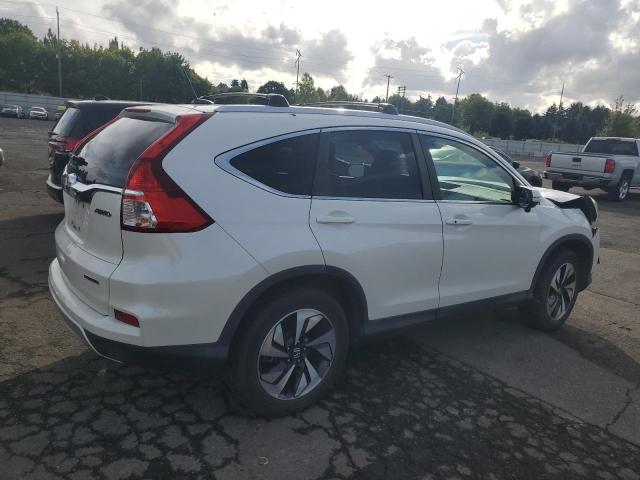 Photo 3 from auction – 2016 HONDA CR-V TOURI with VIN 5J6RM4H90GL106473