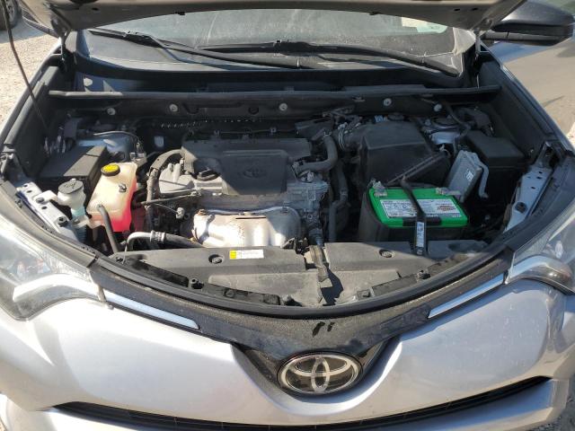 Photo 12 from auction – 2018 TOYOTA RAV4 LE with VIN 2T3BFREV0JW709704