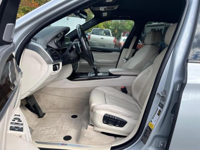 Photo 5 from auction – 2015 BMW X5 XDRIVE5 with VIN 5UXKR6C59F0J74391