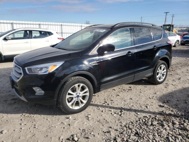 FORD ESCAPE SE 2018 with VIN 1FMCU9GD0JUD26904 - Photo from auction