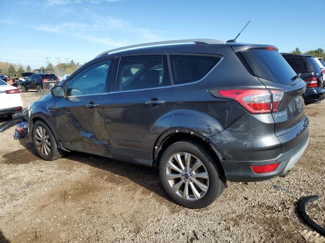 Photo 2 from auction – 2017 FORD ESCAPE TIT with VIN 1FMCU9J95HUA63792