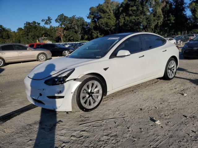 TESLA MODEL 3 2022 with VIN 5YJ3E1EA3NF329032 - Photo from auction