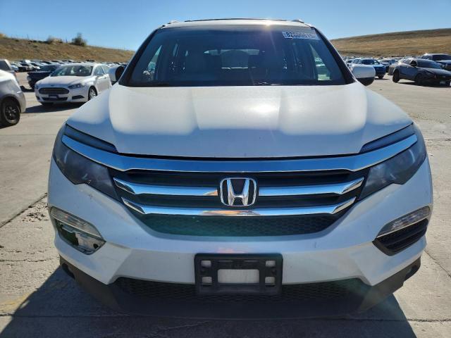 Photo 5 from auction – 2016 HONDA PILOT EXL with VIN 5FNYF6H85GB077280