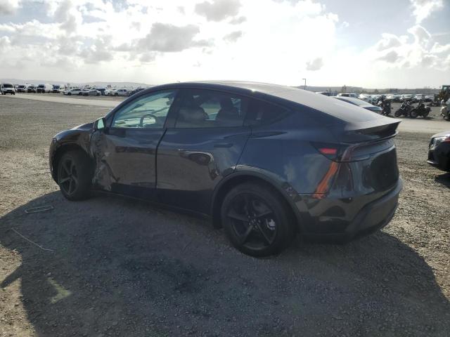 Photo 2 from auction – 2026 TESLA MODEL Y with VIN 7SAYGDED2TF378699