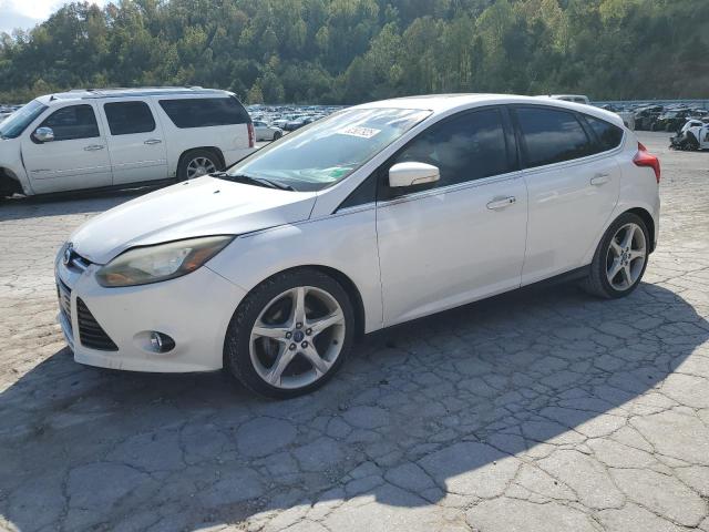 FORD FOCUS TITANIUM 2013 with VIN 1FADP3N27DL181584 - Photo from auction
