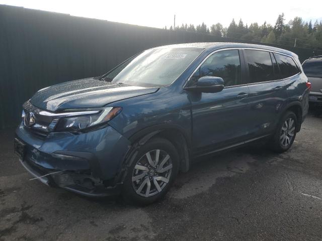 HONDA PILOT EXL 2021 with VIN 5FNYF6H52MB097858 - Photo from auction