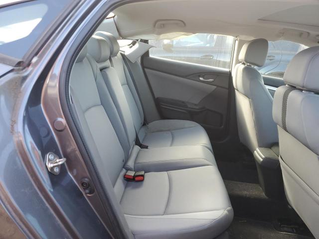 Photo 10 from auction – 2016 HONDA CIVIC with VIN 2HGFC1F34GH643452