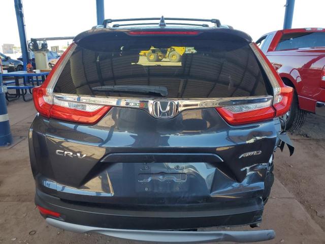 Photo 6 from auction – 2017 HONDA CR-V EX with VIN 2HKRW2H50HH641584