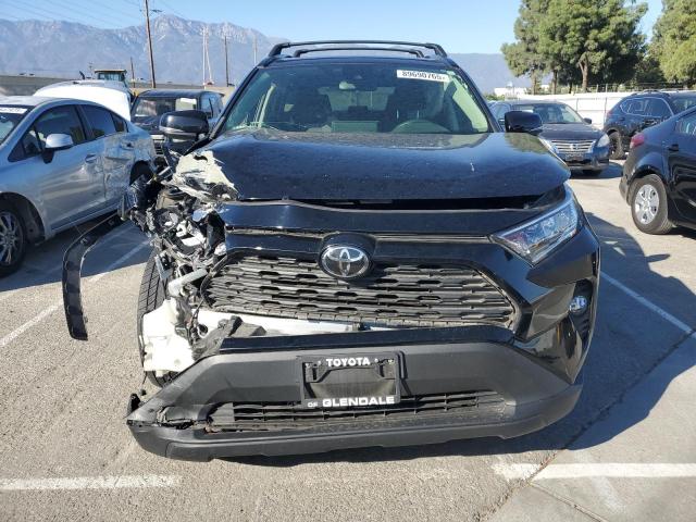 Photo 5 from auction – 2019 TOYOTA RAV4 XLE with VIN JTMP1RFV4KD008424