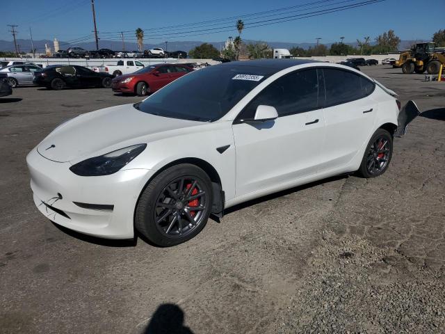 TESLA MODEL 3 2021 with VIN 5YJ3E1EA2MF871589 - Photo from auction