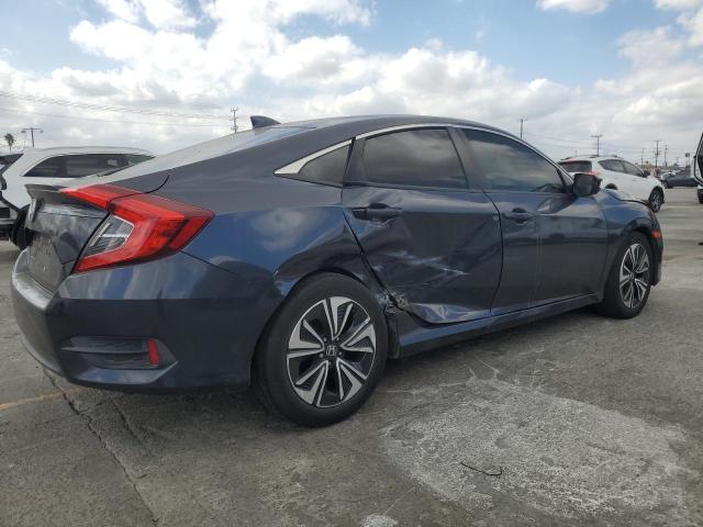 Photo 3 from auction – 2018 HONDA CIVIC EX with VIN JHMFC1F35JX034676