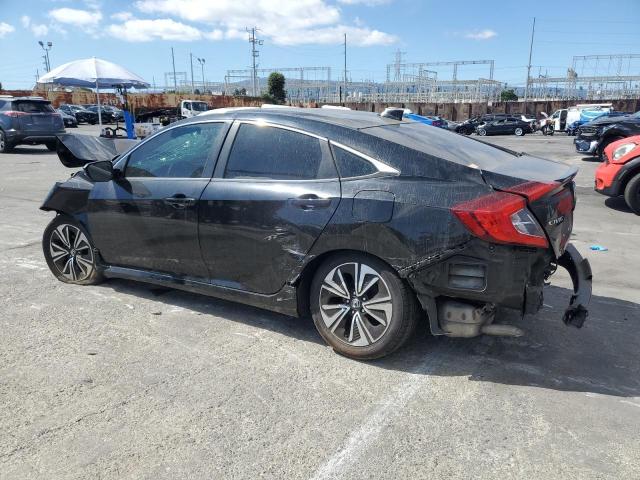 Photo 2 from auction – 2017 HONDA CIVIC EX with VIN 2HGFC1F3XHH656126