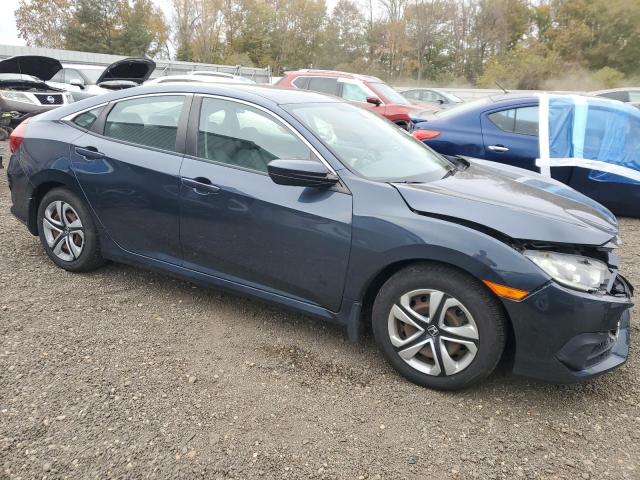 Photo 4 from auction – 2017 HONDA CIVIC LX with VIN 19XFC2F56HE206071