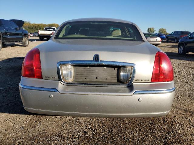 Photo 6 from auction – 2004 LINCOLN TOWN CAR E with VIN 1LNHM81W34Y652204