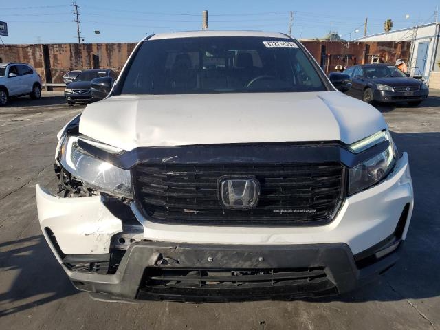 Photo 5 from auction – 2023 HONDA RIDGELINE with VIN 5FPYK3F89PB001372