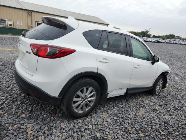Photo 3 from auction – 2015 MAZDA CX-5 TOURI with VIN JM3KE2CY1F0494635