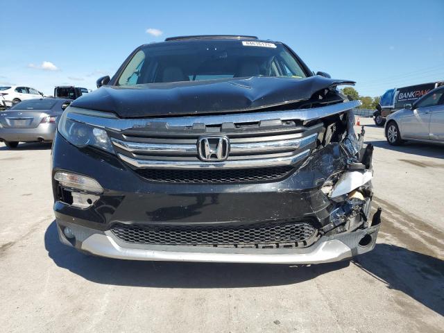 Photo 5 from auction – 2016 HONDA PILOT EXL with VIN 5FNYF5H50GB011512