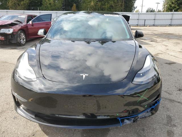 Photo 5 from auction – 2021 TESLA MODEL 3 with VIN 5YJ3E1EAXMF875129