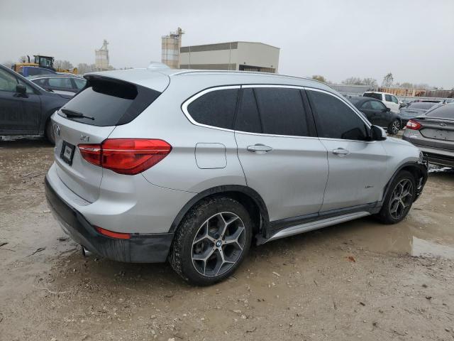 Photo 3 from auction – 2017 BMW X1 XDRIVE2 with VIN WBXHT3C3XH5F80508