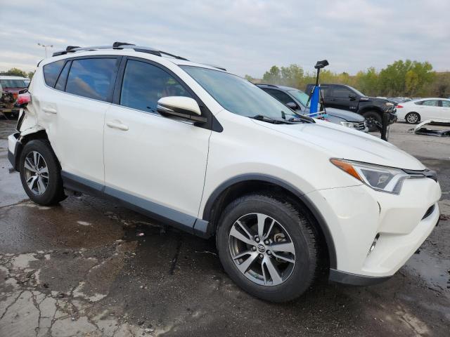 Photo 4 from auction – 2017 TOYOTA RAV4 XLE with VIN JTMRFREV7HD200876