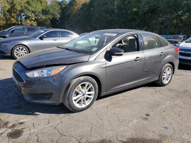 FORD FOCUS SE 2017 with VIN 1FADP3FE3HL310306 - Photo from auction