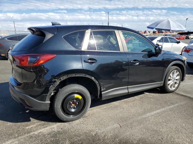 Photo 3 from auction – 2014 MAZDA CX-5 GT with VIN JM3KE2DY3E0357628