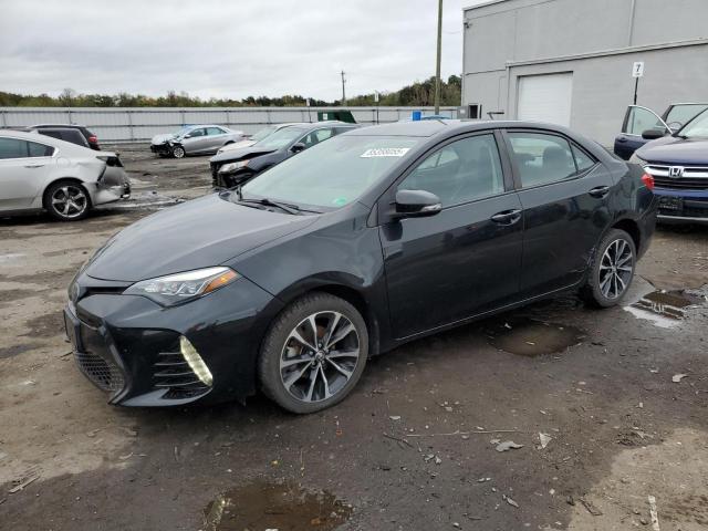 TOYOTA COROLLA L 2018 with VIN 2T1BURHE4JC986545 - Photo from auction