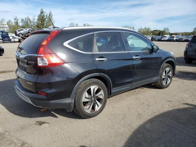 Photo 3 from auction – 2016 HONDA CR-V TOURING with VIN 5J6RM4H96GL800326