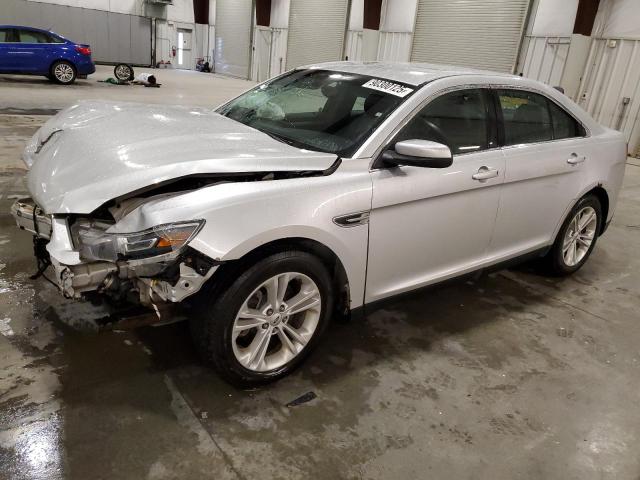 FORD TAURUS SEL 2014 with VIN 1FAHP2H80EG169783 - Photo from auction