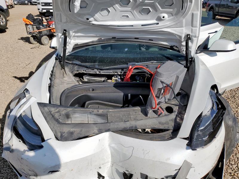 Photo 11 from auction – 2022 TESLA MODEL 3 with VIN 5YJ3E1EB3NF298423