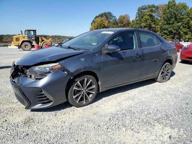 TOYOTA COROLLA L 2018 with VIN 5YFBURHE3JP798440 - Photo from auction