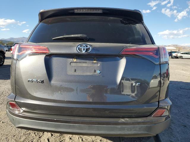 Photo 6 from auction – 2018 TOYOTA RAV4 LE with VIN 2T3ZFREV8JW452497