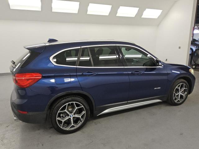 Photo 3 from auction – 2017 BMW X1 XDRIVE2 with VIN WBXHT3C34H5F81962