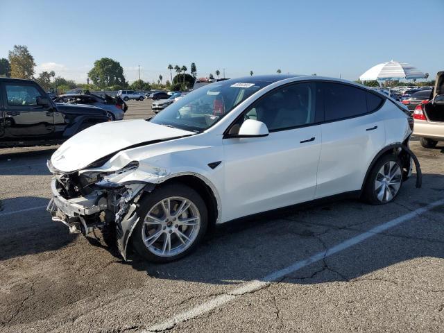 TESLA MODEL Y 2023 with VIN 7SAYGDEE5PA121046 - Photo from auction