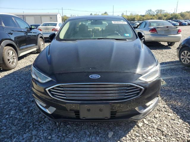 Photo 5 from auction – 2018 FORD FUSION TIT with VIN 3FA6P0D99JR206049