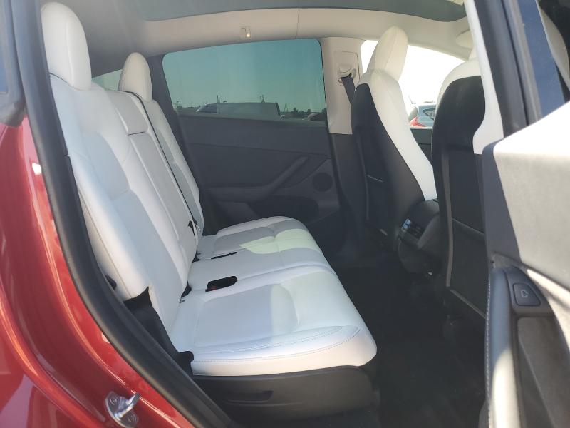 Photo 11 from auction – 2023 TESLA MODEL Y with VIN 7SAYGAEE4PF661036