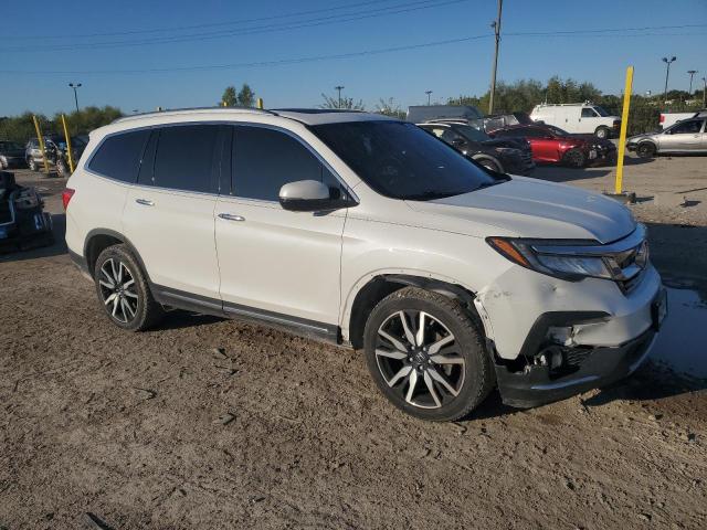 Photo 4 from auction – 2020 HONDA PILOT ELIT with VIN 5FNYF6H06LB033387