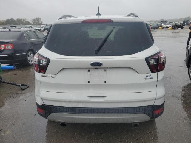 Photo 6 from auction – 2018 FORD ESCAPE SE with VIN 1FMCU9GD1JUD43128