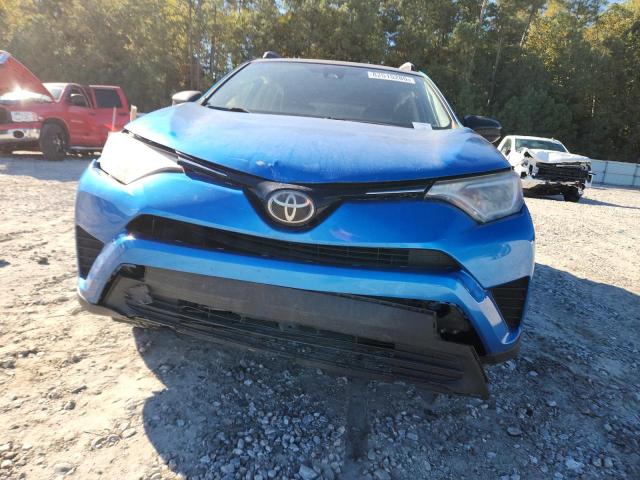 Photo 5 from auction – 2017 TOYOTA RAV4 LE with VIN JTMZFREV3HJ135641