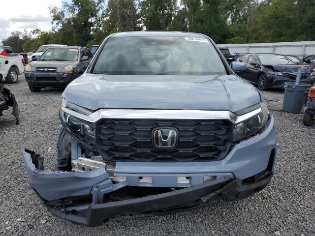 Photo 5 from auction – 2022 HONDA PASSPORT E with VIN 5FNYF7H58NB006552