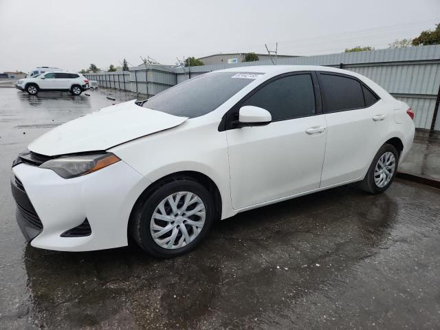 TOYOTA COROLLA L 2017 with VIN 5YFBURHE9HP681486 - Photo from auction