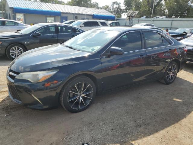 TOYOTA CAMRY LE 2017 with VIN 4T1BF1FK9HU661466 - Photo from auction