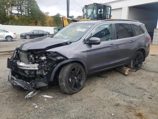 HONDA PILOT SE 2022 with VIN 5FNYF6H22NB048893 - Photo from auction