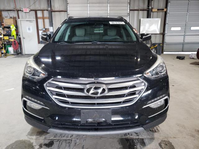 Photo 5 from auction – 2018 HYUNDAI SANTA FE S with VIN 5NMZU3LB8JH102867