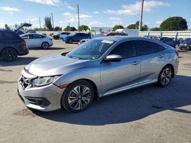 HONDA CIVIC EX 2016 with VIN 19XFC1F36GE008646 - Photo from auction