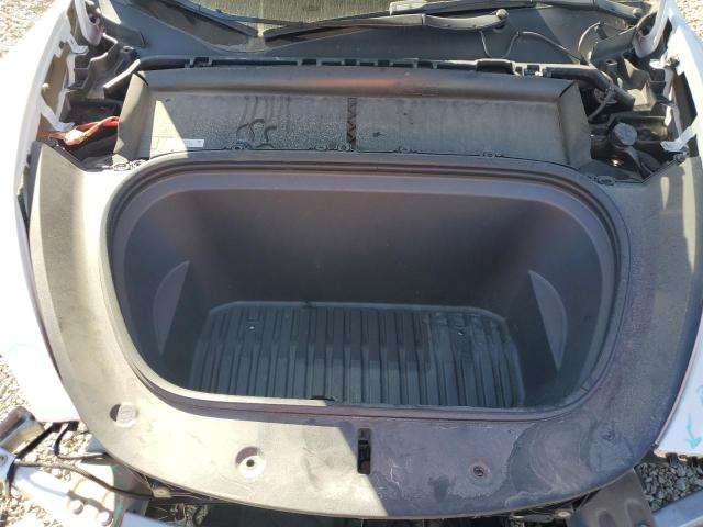 Photo 11 from auction – 2023 TESLA MODEL Y with VIN 7SAYGDEEXPF660359