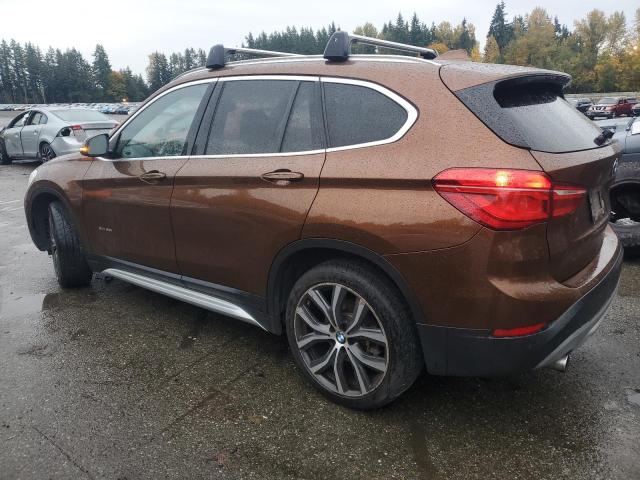 Photo 2 from auction – 2017 BMW X1 XDRIVE2 with VIN WBXHT3C36H5F70882